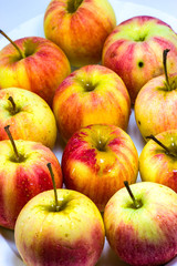 Red apples on white background