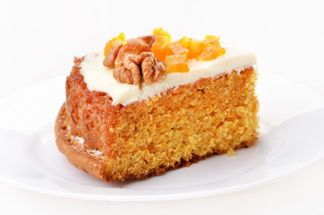 Piece of carrot cake on white plate