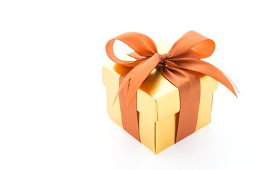 Gold gift box isolated on white background