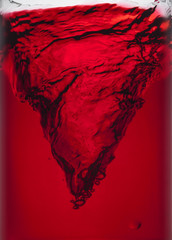 swirl of red liquid small typhoon