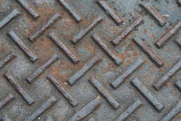 Old rusty metal plate to prevent slipping