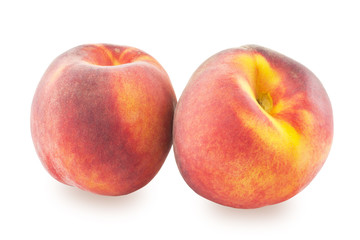 Two peaches on a white background