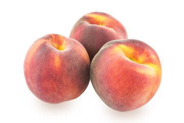 Fototapeta na wymiar Three peaches on a white background