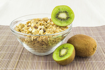 Cereal with kiwi on the mat