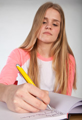 Scandinavian cute young girl writting