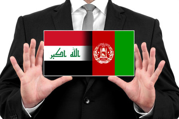 Businessman holding Iraq and Afghanistan Flag