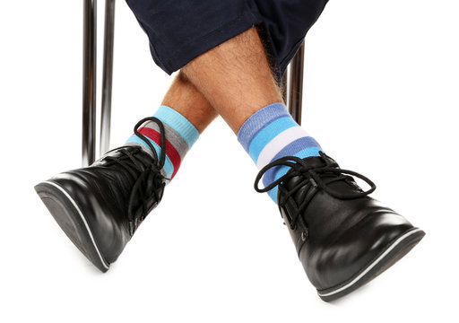 Man Leg In Suit And Colorful Socks, Isolated On White