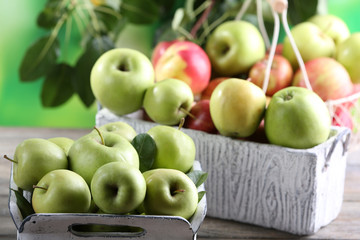 Juicy apples in garden box, close-up