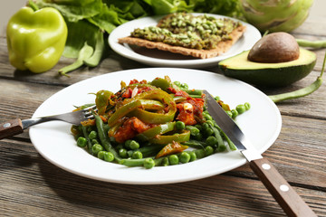 Healthy salad with peas and asparagus served