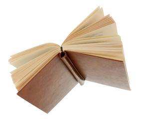 Opened book isolated on white