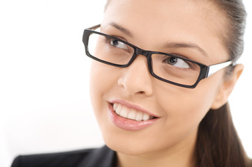 Beautiful young smiling woman in glasses,