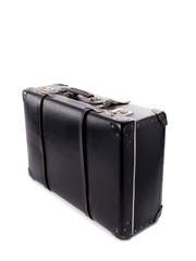 An old black vintage leather suitcase with straps and locks