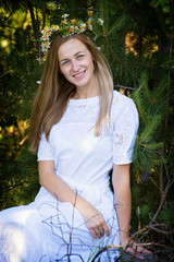 young woman on a background of grass