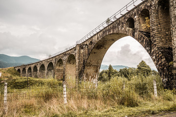 Old railway bridge in Carpathian mountains