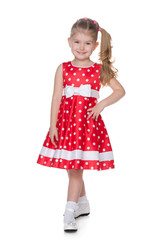 Pretty little girl in the polka dot dress