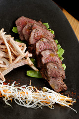 Lemongrass grilled beef steak with snow peas and taro potatoes