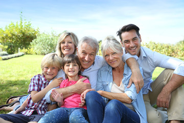 Happy 3 generation family in grandparents' backyard - 70569031