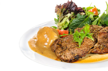 Rump steak with mashed potatoes and mix vegetable on plate
