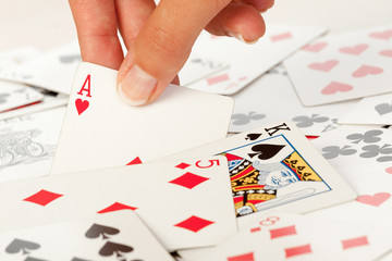 Woman hand holding an ace of heart
