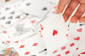 Woman hand holding an ace of heart