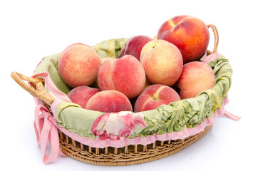 Ripe peaches in a basket