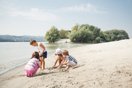 Small group of children playing on the beach