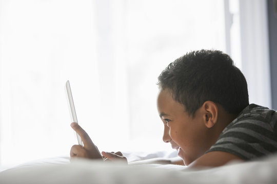 Boy using a tablet.