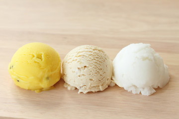 ice cream scoop for vegetarian on wooden plate