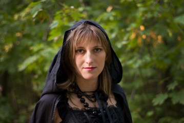 Fototapeta premium Portrait of Witch in the Forest