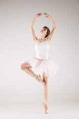 Fototapeta na wymiar Ballet dancer in white tutu posing