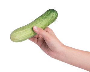 Hand holding cucumber on white background