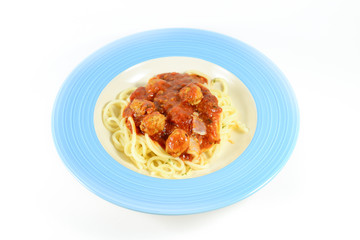 Spaghetti with meatballs in tomato sauce
