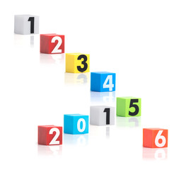 Colorful plastic of year numbers on a white background