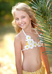 portrait of little girl in tropical style