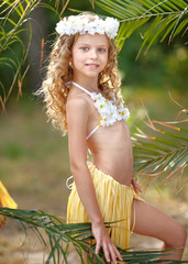 portrait of little girl in tropical style © zagorodnaya