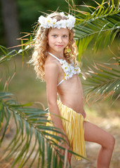 portrait of little girl in tropical style © zagorodnaya