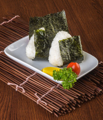 japanese cuisine. onigiri or rice on the background