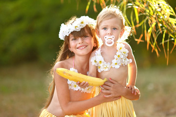 portrait of two girl in tropical style © zagorodnaya