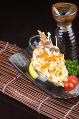 japanese cuisine. grilled shell fish on the background