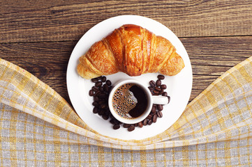 Croissant and cup of coffee