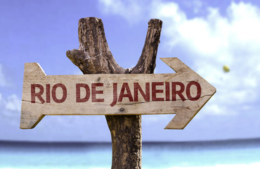 Rio de Janeiro sign with a beach on background