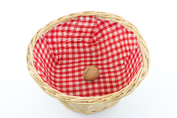 Basket with one single walnut