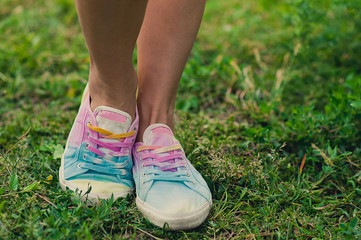 Woman shoes and summer grass