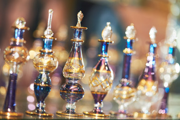 perfume or oil in decorative glass bottles
