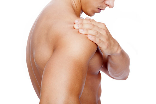 Muscular Man With Shoulder Pain, Isolated On White Background