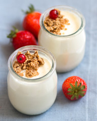 Obraz na płótnie Canvas Jars of fresh natural yogurt