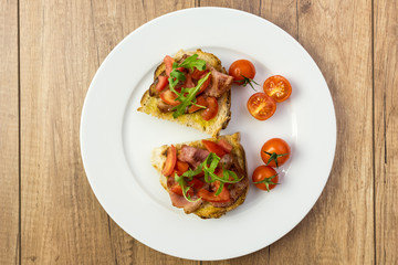 Plate With Italian Bruschetta On Table