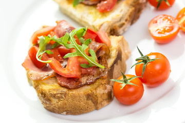 Bruschetta Grilled Bread, Prosciutto, Rucola And Cherry Tomatoes