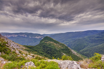 top of the mountain with dark dramatic sky