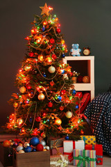 Fototapeta premium Decorated Christmas tree at home